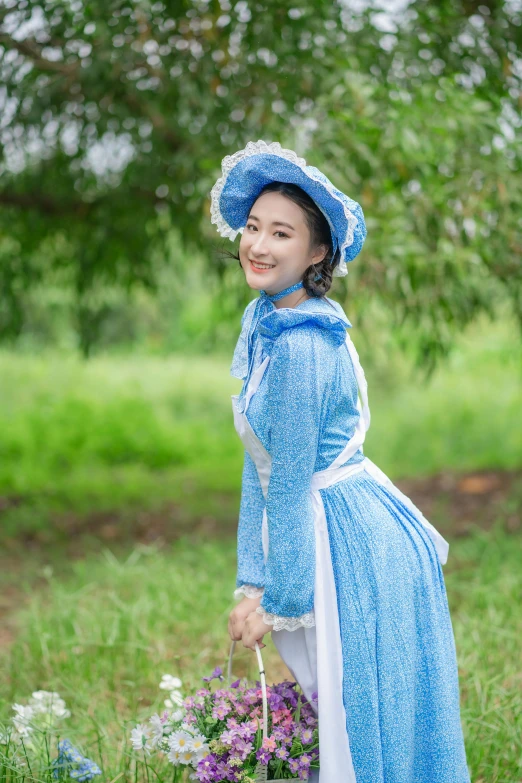 young woman dressed in a princess outfit for a po shoot