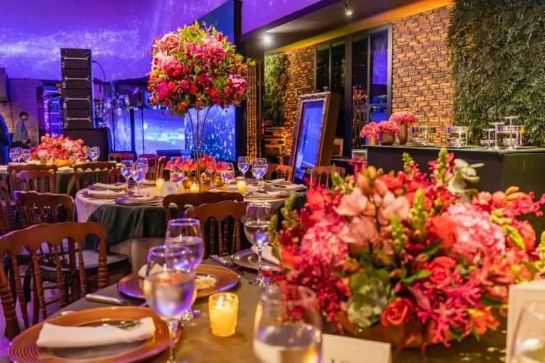 a beautiful restaurant decorated with flowers and candles