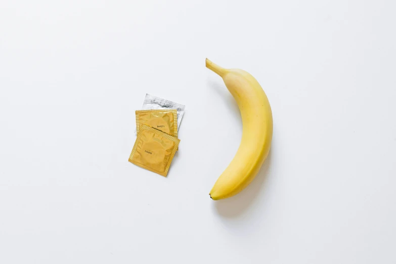 a banana and a bag of gold packets