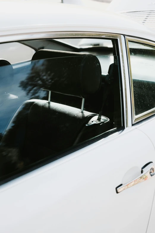 an empty car seat on the back of the car