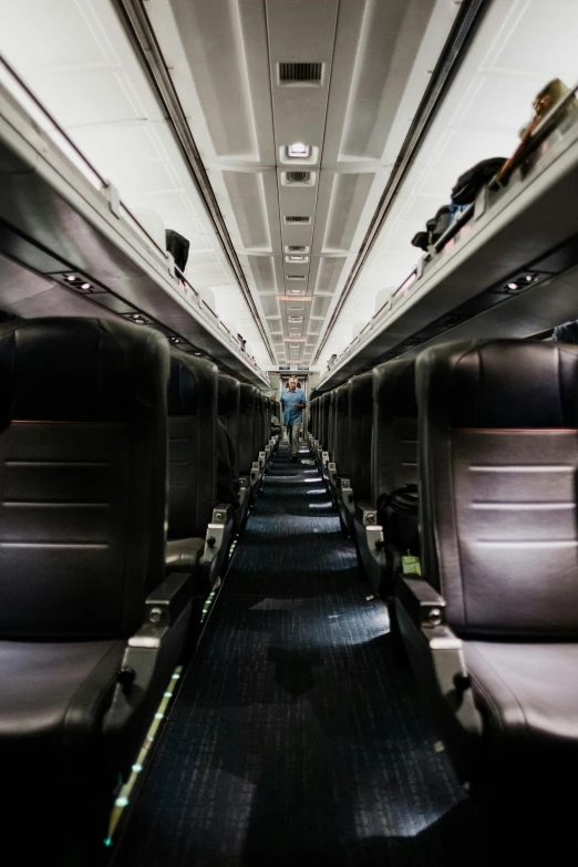 a view of the inside of an airplane from its seats