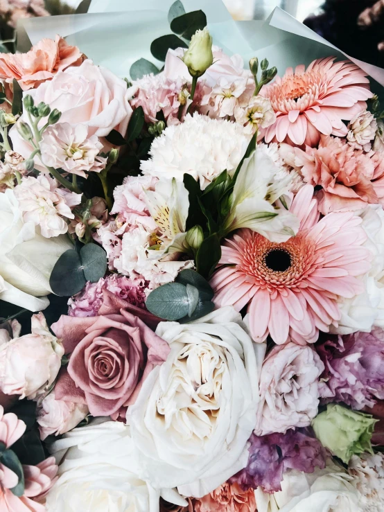 the large bouquet is in pastel colors