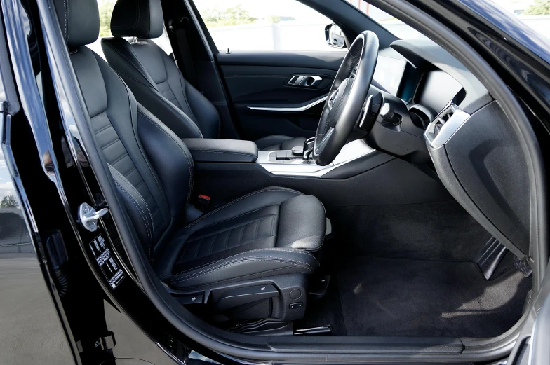 an image of a car door and passenger seat