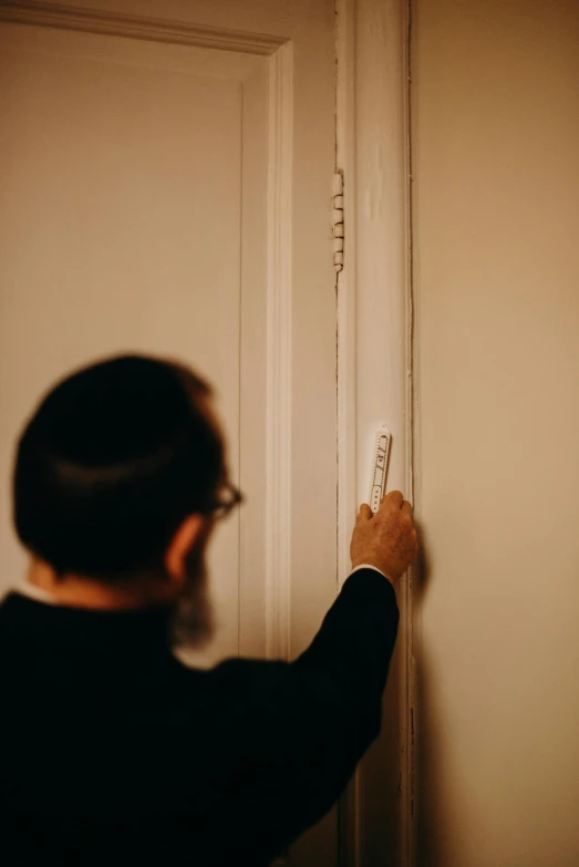 a person who is holding some kind of white toothpaste