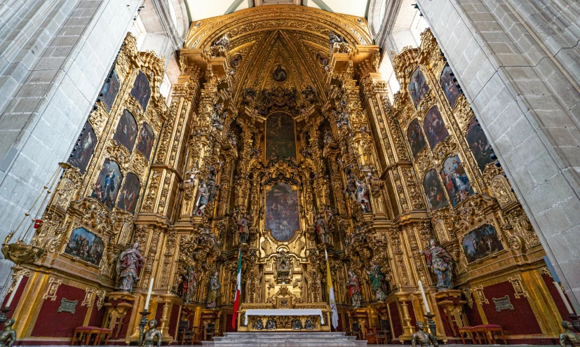 a very fancy church with elaborate statues and large arches