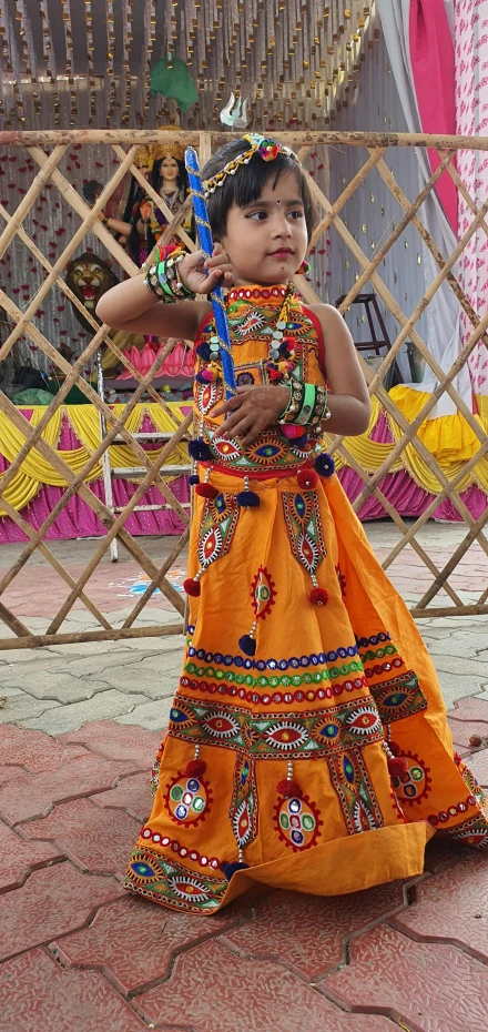 a  is dressed in an indian style dress