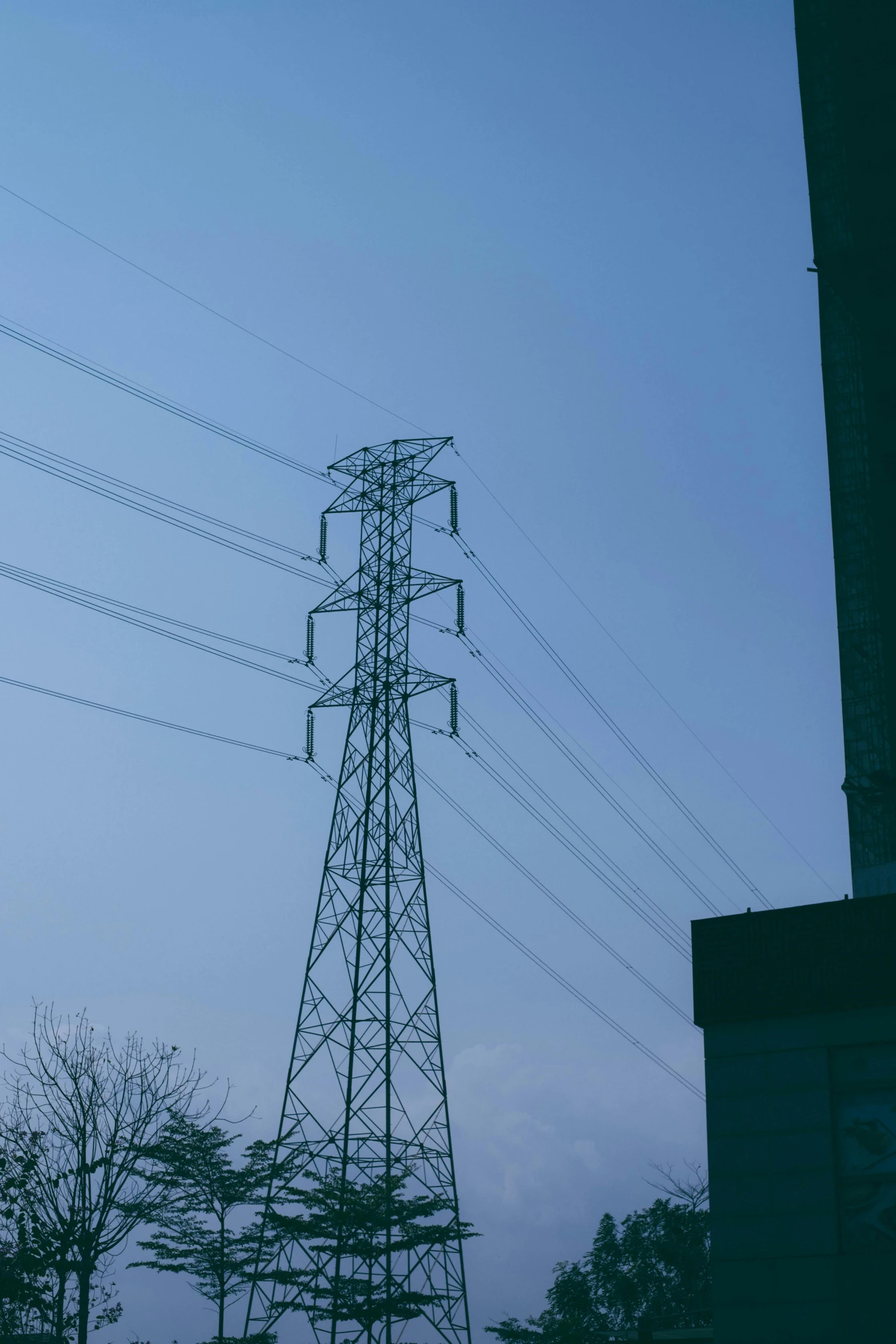 multiple electrical lines above an electric pole