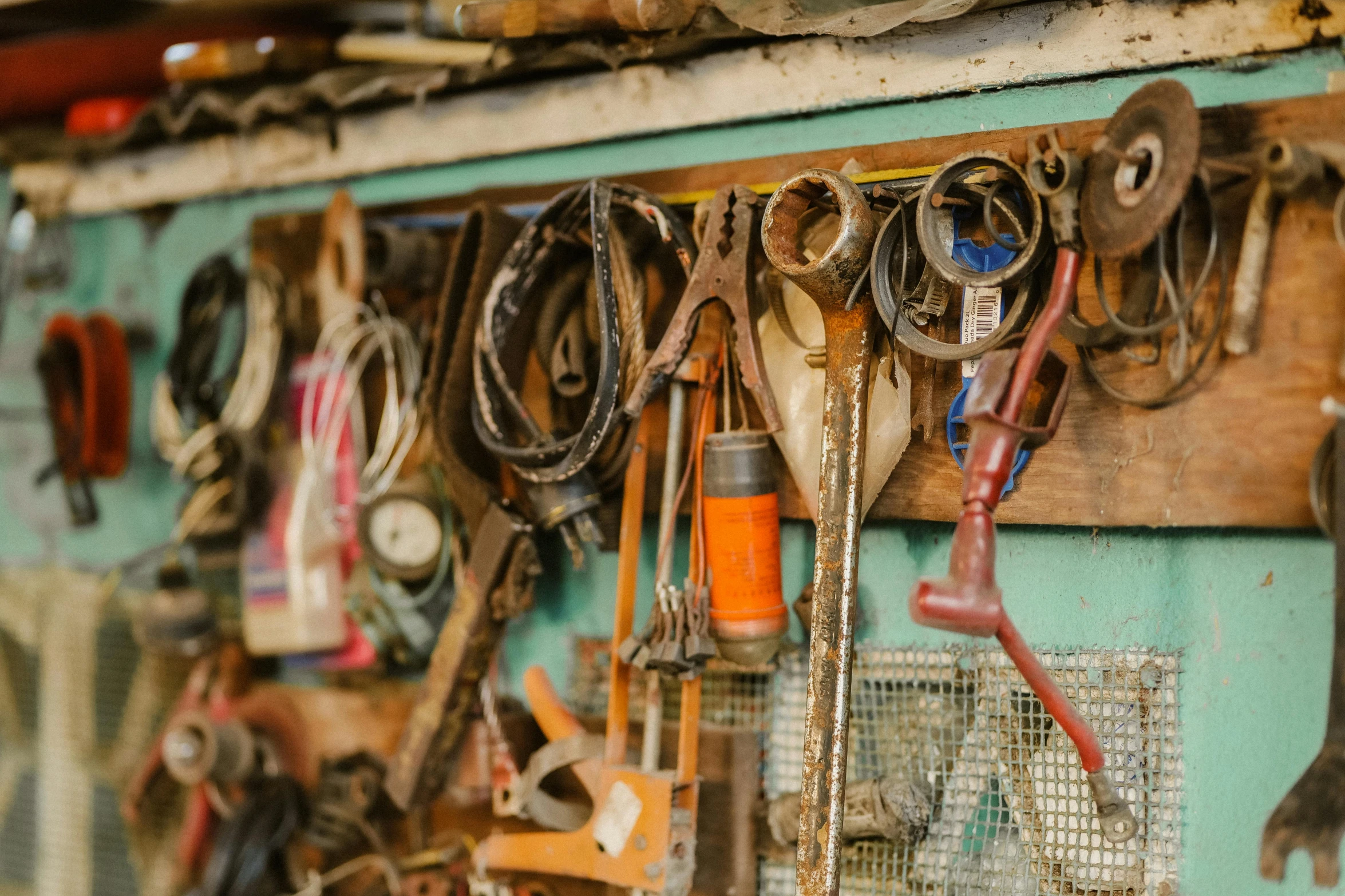 there is lots of old items hanging on the wall