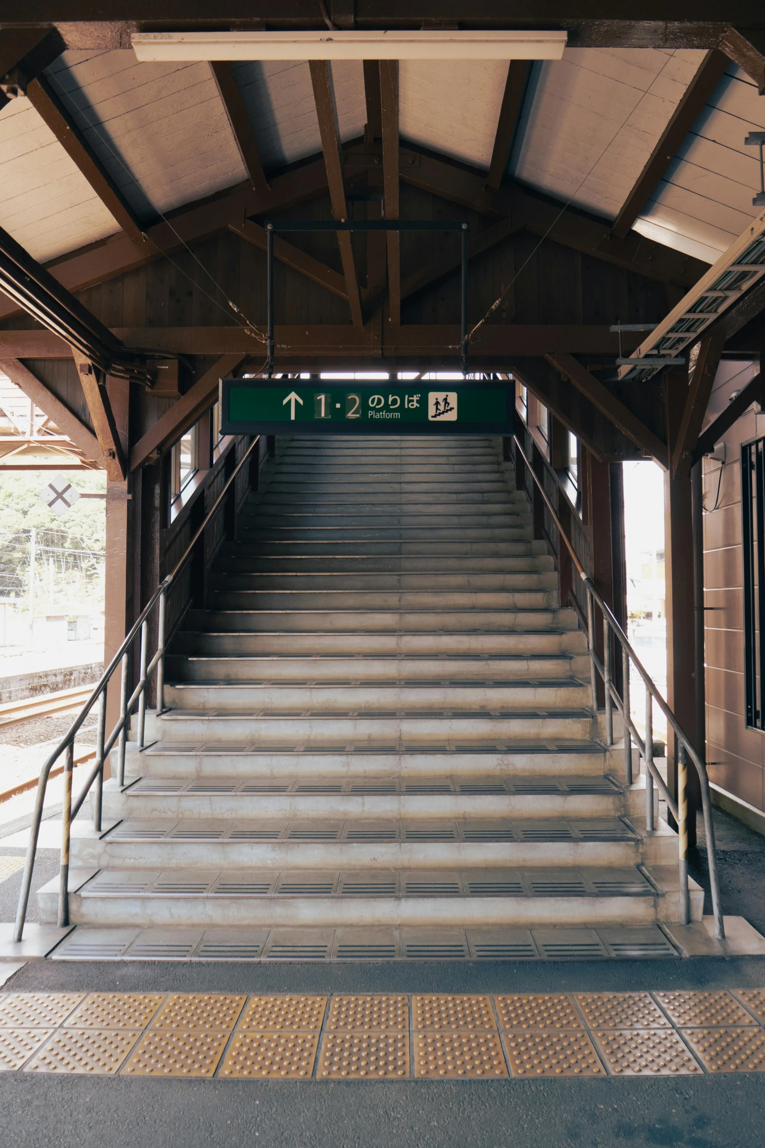 a stairwell leading to the upper level of a station