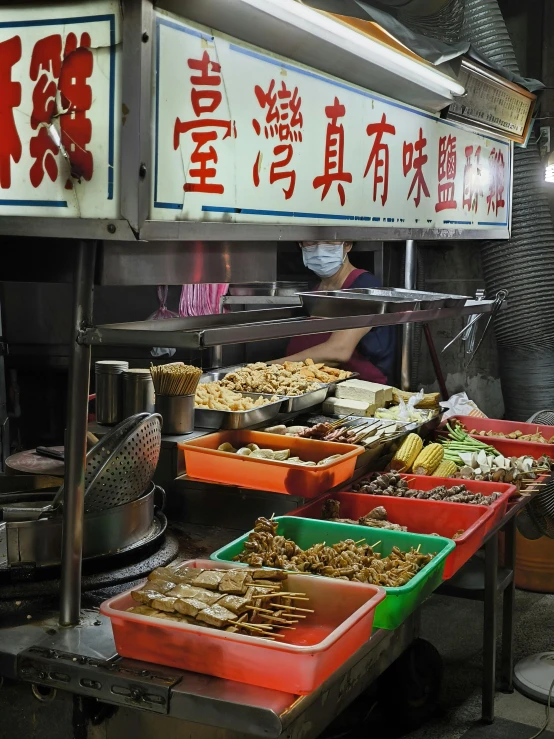 many dishes on trays on the table