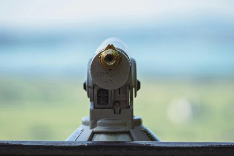 a gun that is laying on a ledge