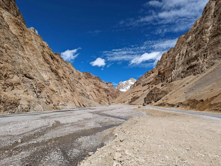 the empty street is very rocky and dry