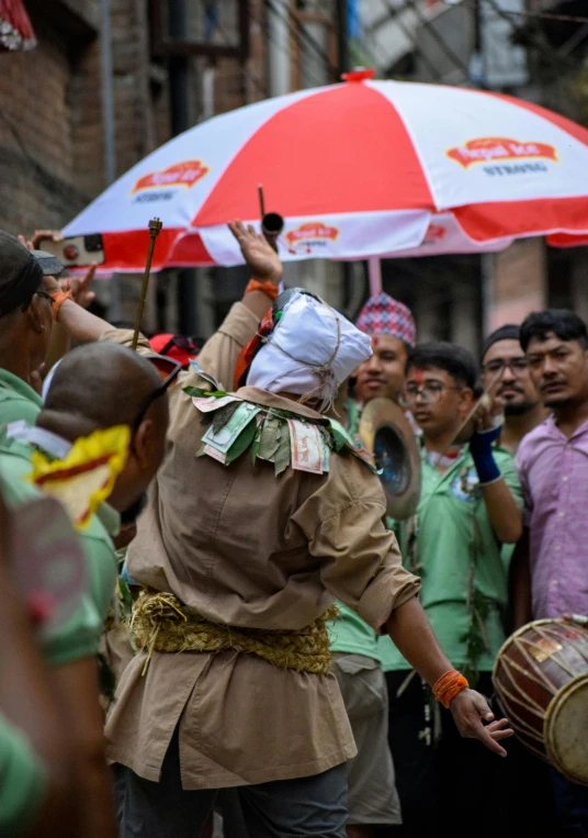 the group of people are wearing indian garb