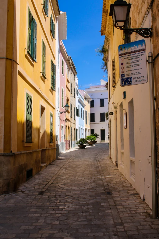 the buildings line up against the side of the street