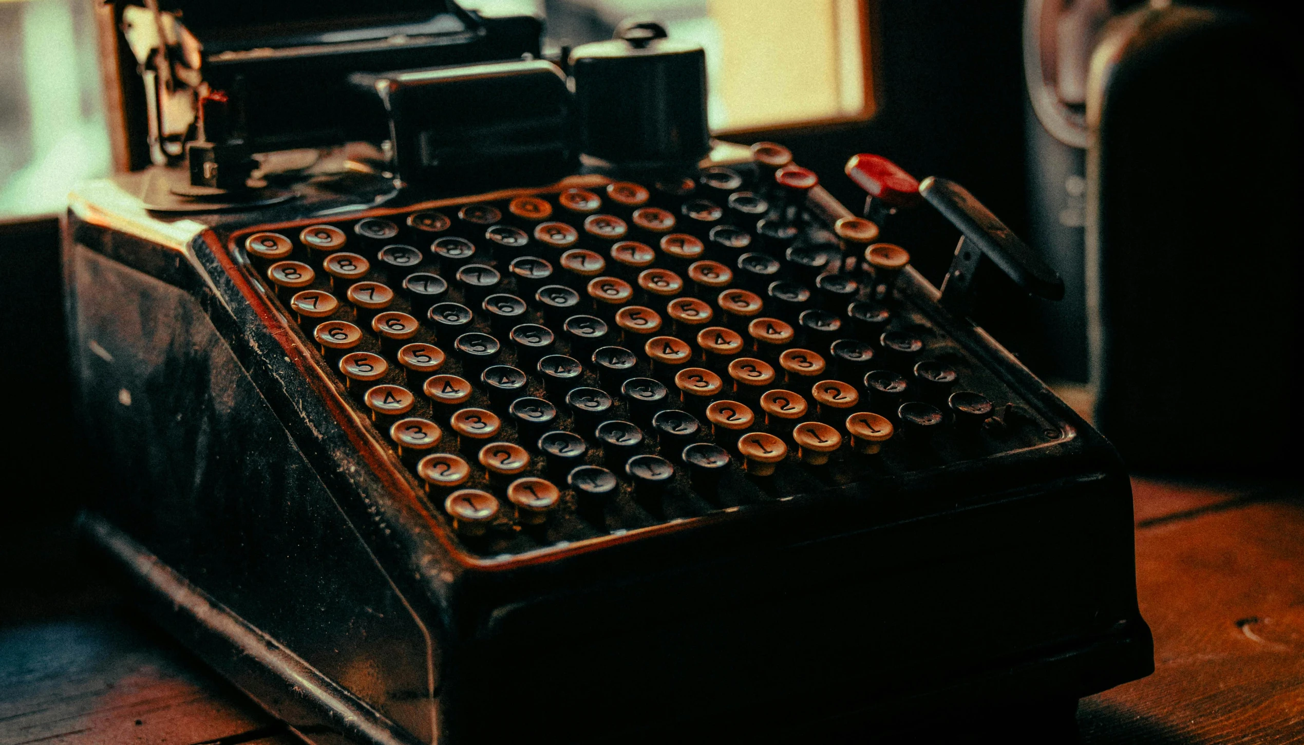 a old typewriter is sitting on a table