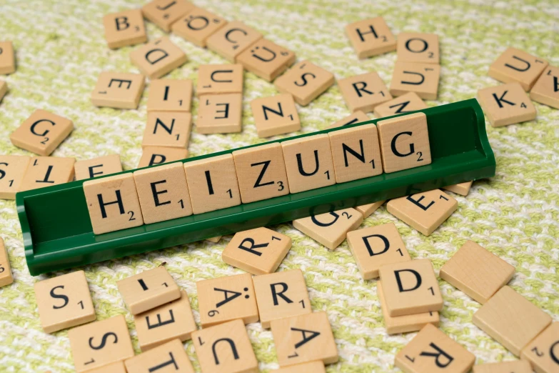 scrabble spelling spelled by scrabble letters that spell out the word heinz