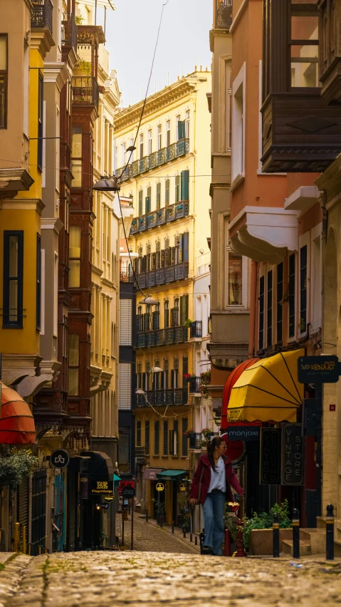 a person walking in the middle of a city street