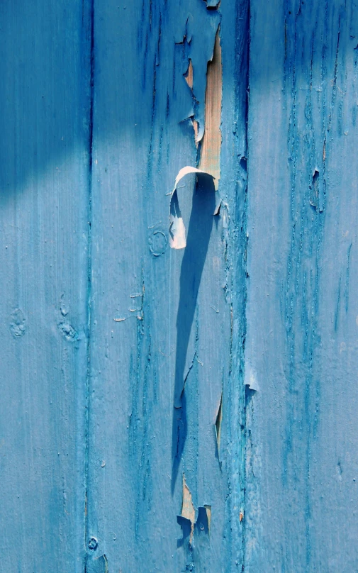 the blue paint has a  in the wall