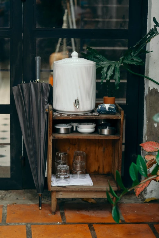 a table with some dishes and pots on it