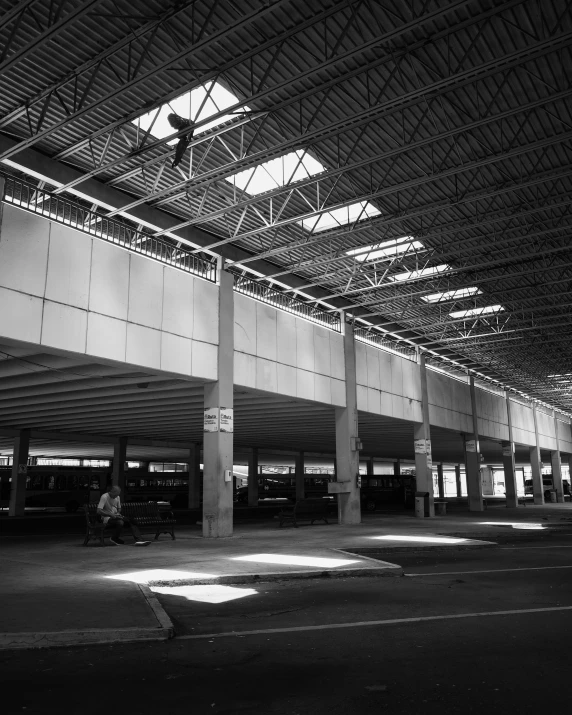 black and white po of people in an airport