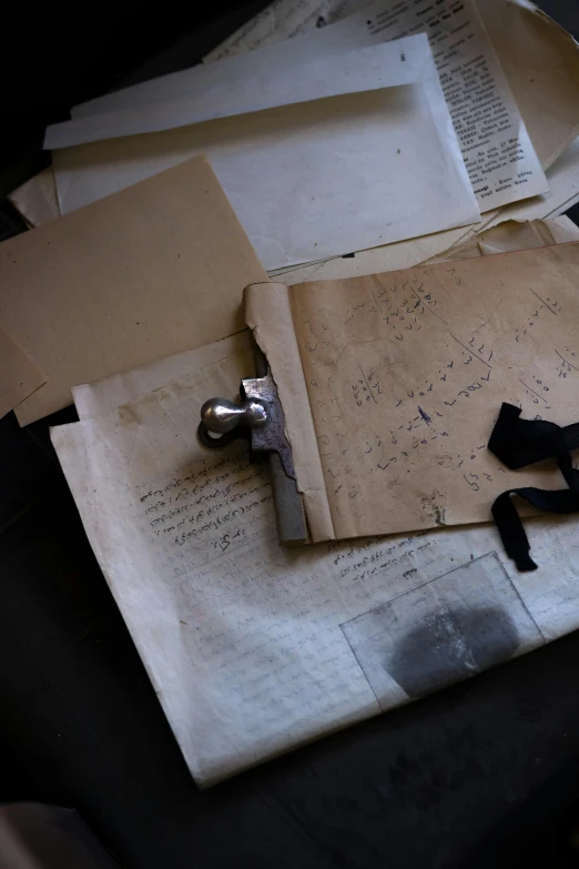 a broken razor with writing sitting on top of it