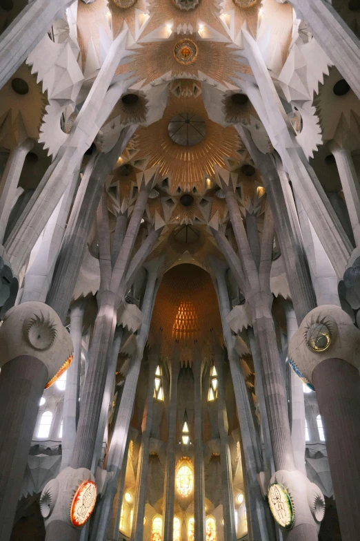 the inside of a building with many columns