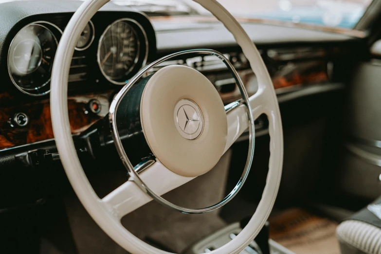 a steering wheel and dashboard of a car