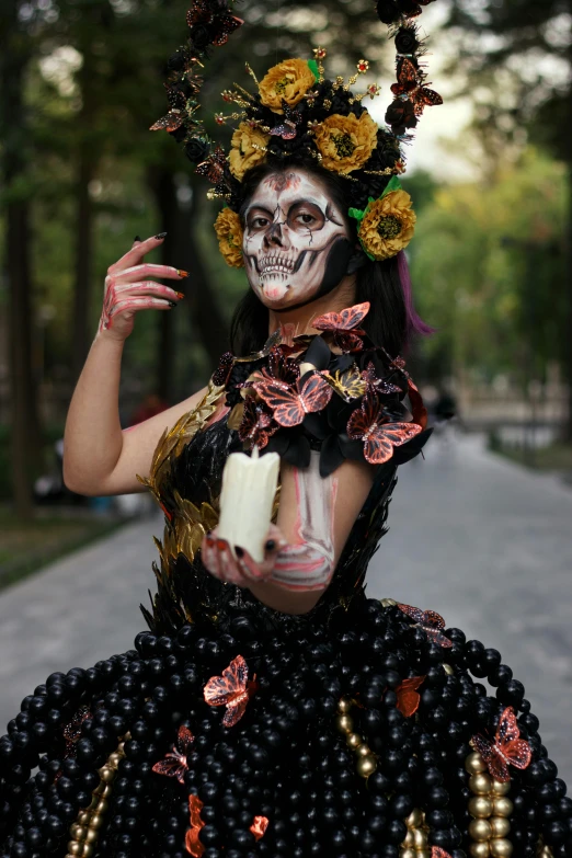 a woman in a black and white skeleton dress