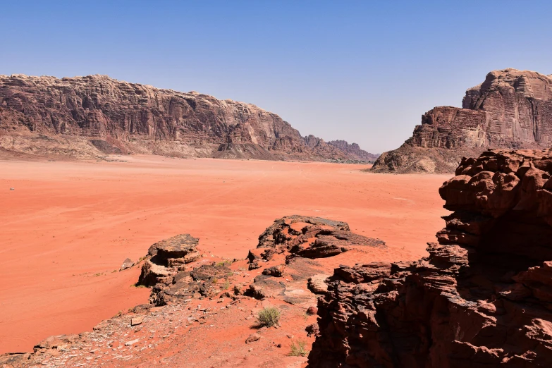 the desert is red sand and very rocky