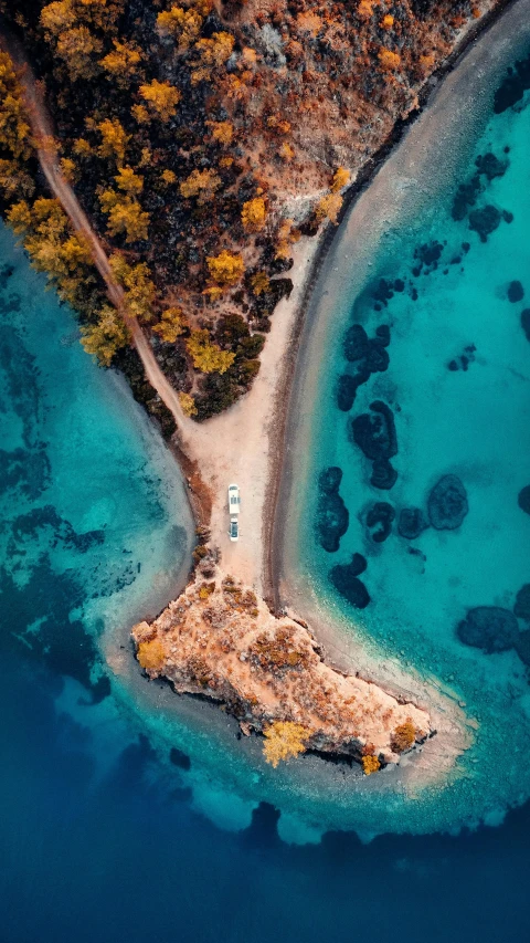 a small island in the middle of some water