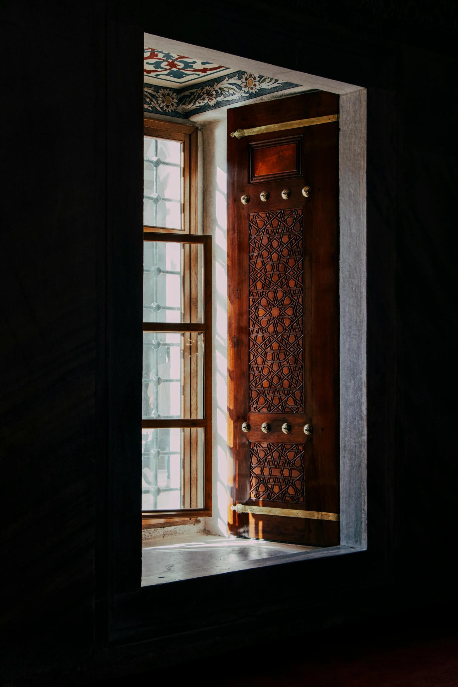 view from an open window into the floor and wall