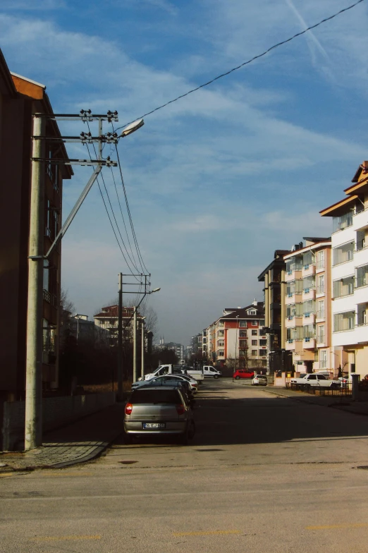 the city street with many cars on it