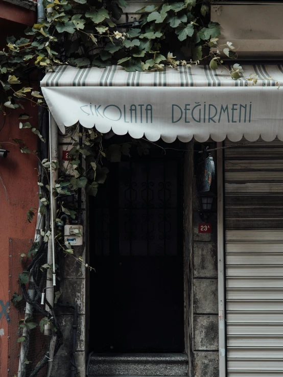 the front of a building with an awning