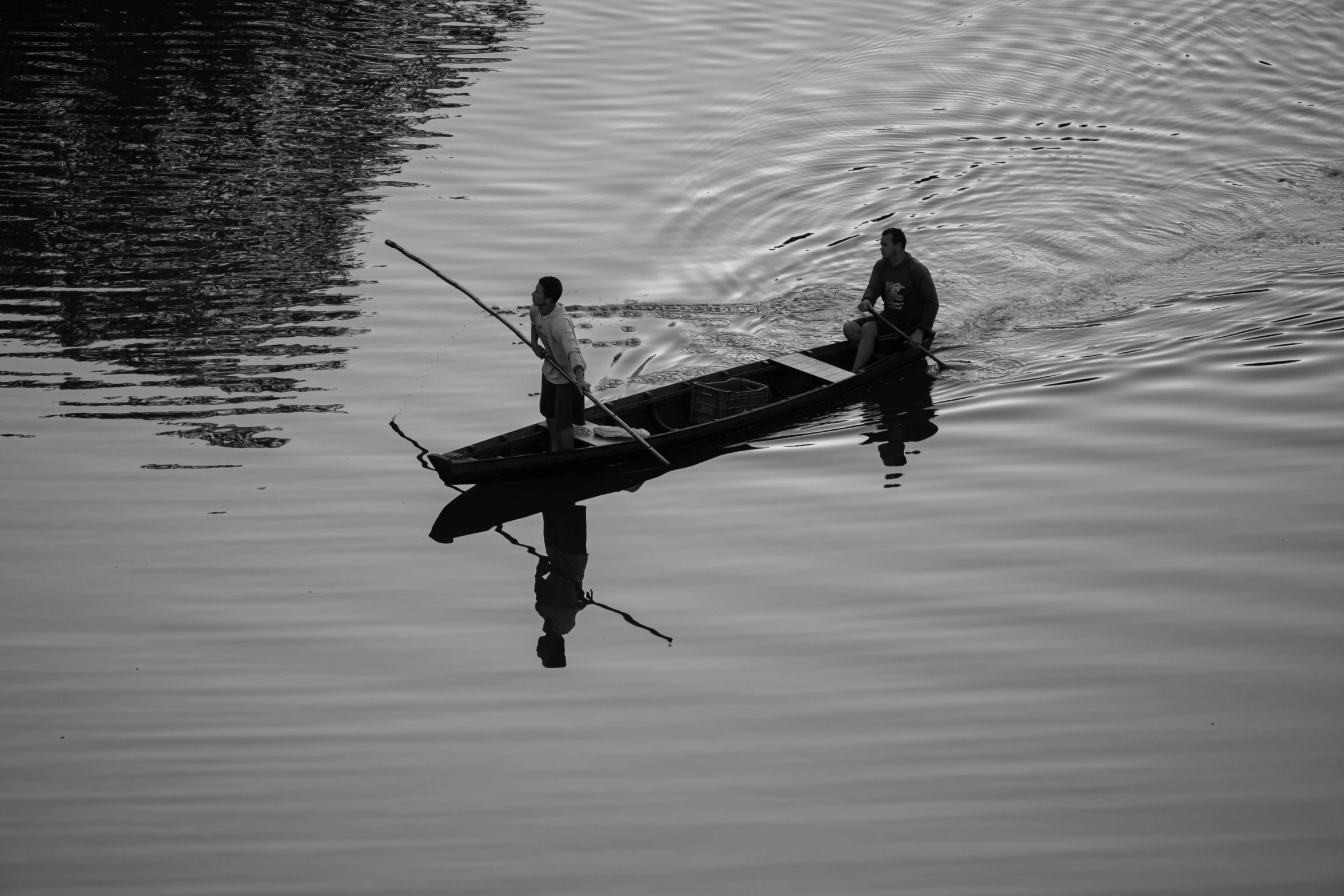 a person in a boat with poles on it's side