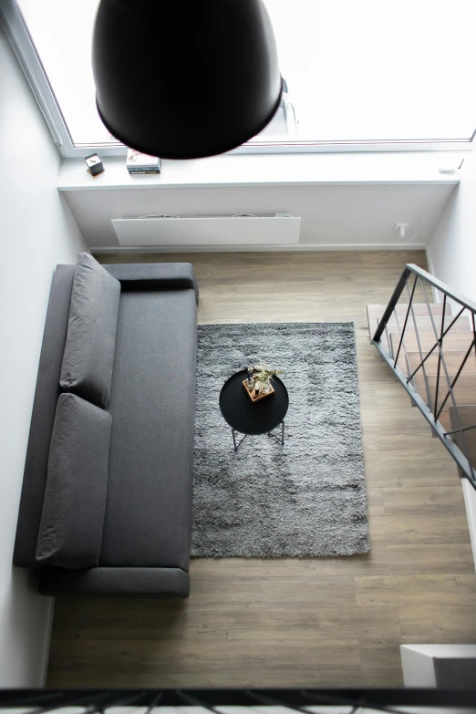 a view from above of the living room and staircase