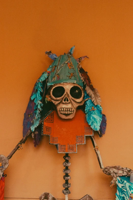 a day of the dead skeleton with an orange dress