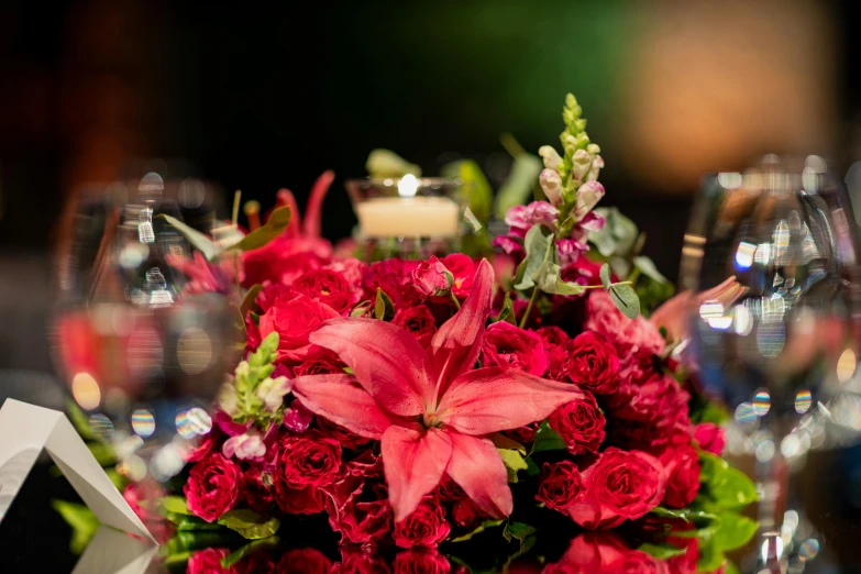 flowers arranged inside of a bouquet at a table setting