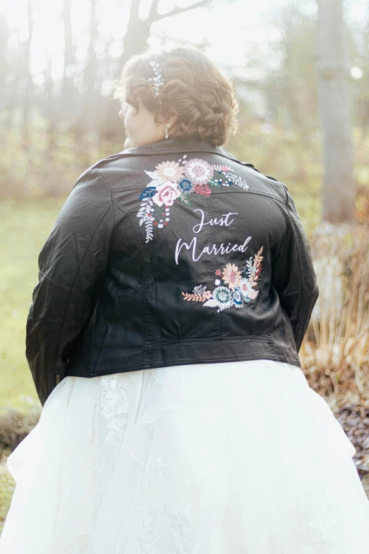 a bride looks at the horizon as she stands outside