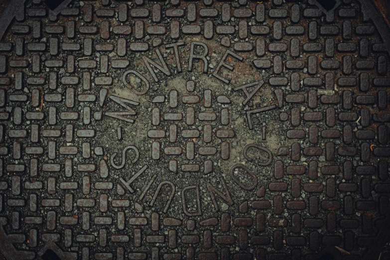 a black stone sidewalk with text written all over it