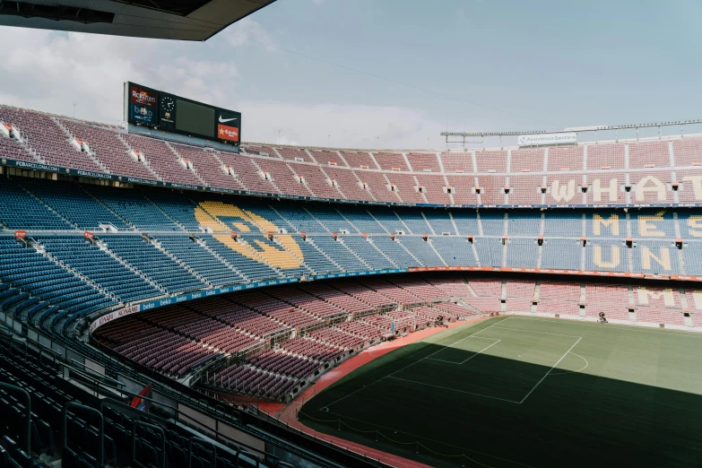 the interior of an empty stadium showing the seats