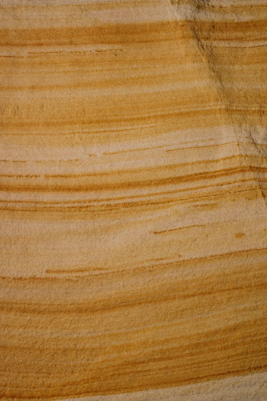 a closeup of a wood surface with grain patterns