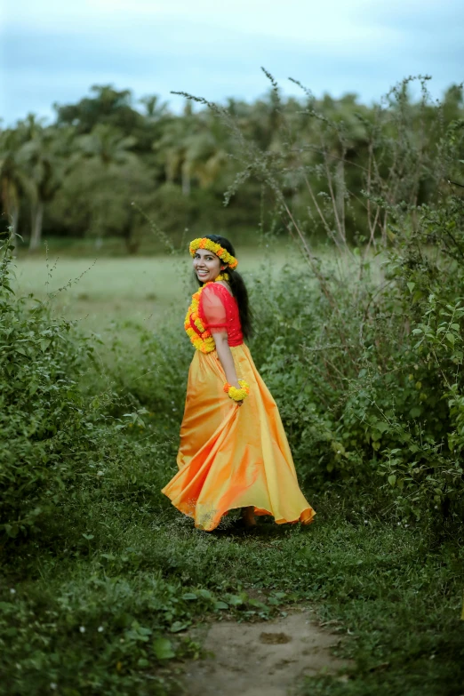 the girl is wearing a bright and colorful outfit