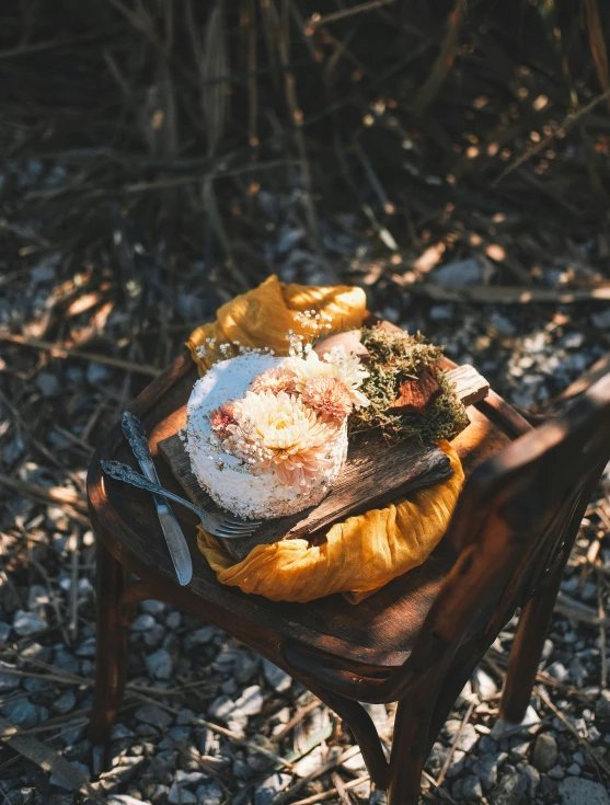 a wooden table topped with a pastry and other foods