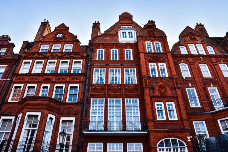 many buildings have white windows on each