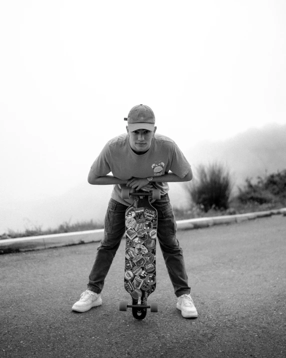 black and white pograph of a man riding his skateboard