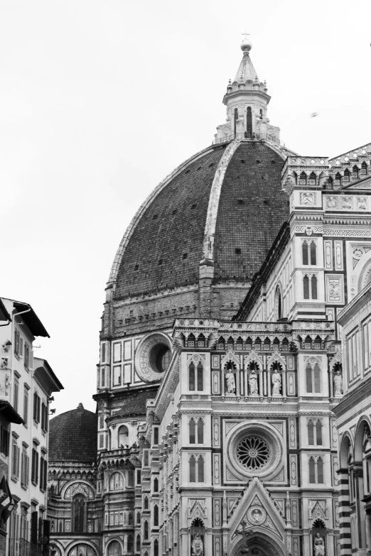 a black and white po of the top of a church