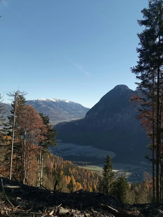 a view from a hill looking at a valley