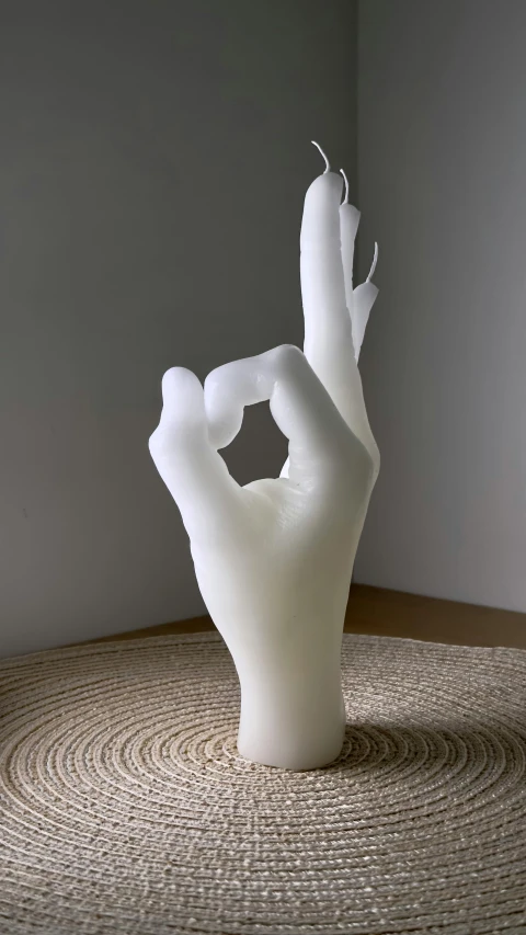 a sculpture on the floor in a room