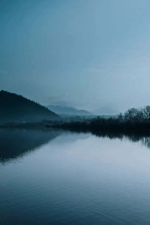 an image of the water on a foggy day