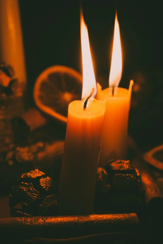 candles and cookies with some lit inside them